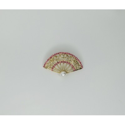 Broche brillantes dorado