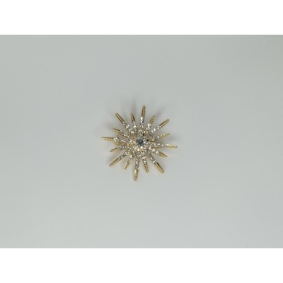 Broche estrella dorado