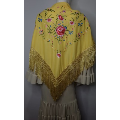 Mantón amarillo bordado en tonos varios