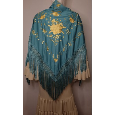 Mantón turquesa bordado en dorado