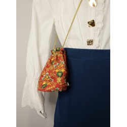 Bombonera roja detalles tonos varios