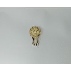 Peina moneda dorado